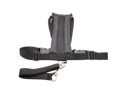 A small size E Black car safety harness with a short handle lead.