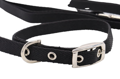 A small, black webbing puppy collar and lead set.