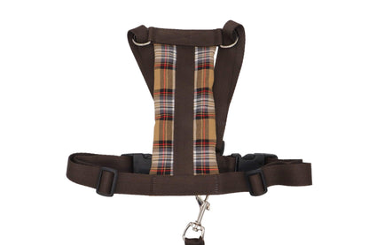 A stunning brown car safety harness with a light brown cross hatched padded chest plate