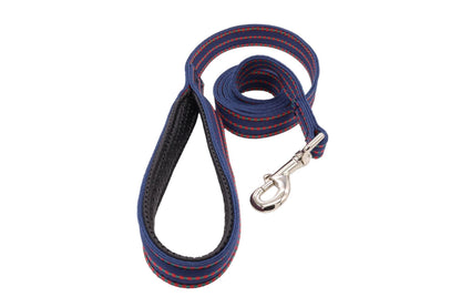 Nylon webbing dog lead in navy pattern with a padded handle. The lead is made up of two nylon webbing strips and are sewn together in England. There is a large trigger hook con It is spiralled with the handle and trigger hook showing outside of the loop.nector for heavy duty dogs.