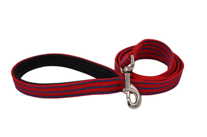 A red nylon double thickness webbing lead with a padded handle. The pattern is three strips of blue and green overlapping diamond shapes.