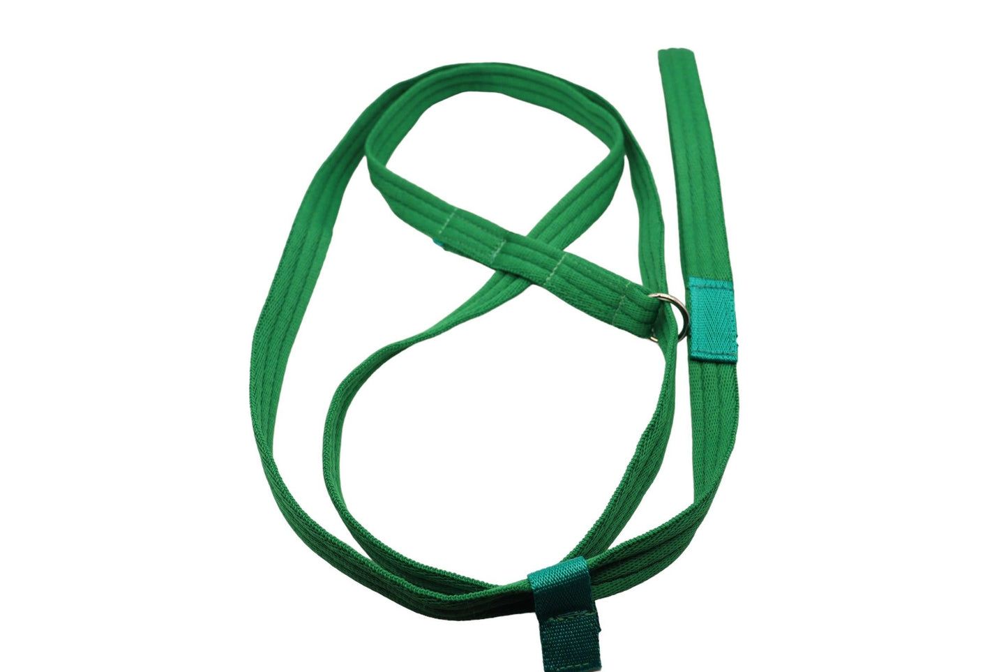 A figure of 8 dog lead in a natural forest green. Made of triple ribbed Softex nylon webbing. The 8 loop for the dogs collar and snout  then follows around the 1.5m lead looped around with the handle on the right hand side of the 8.