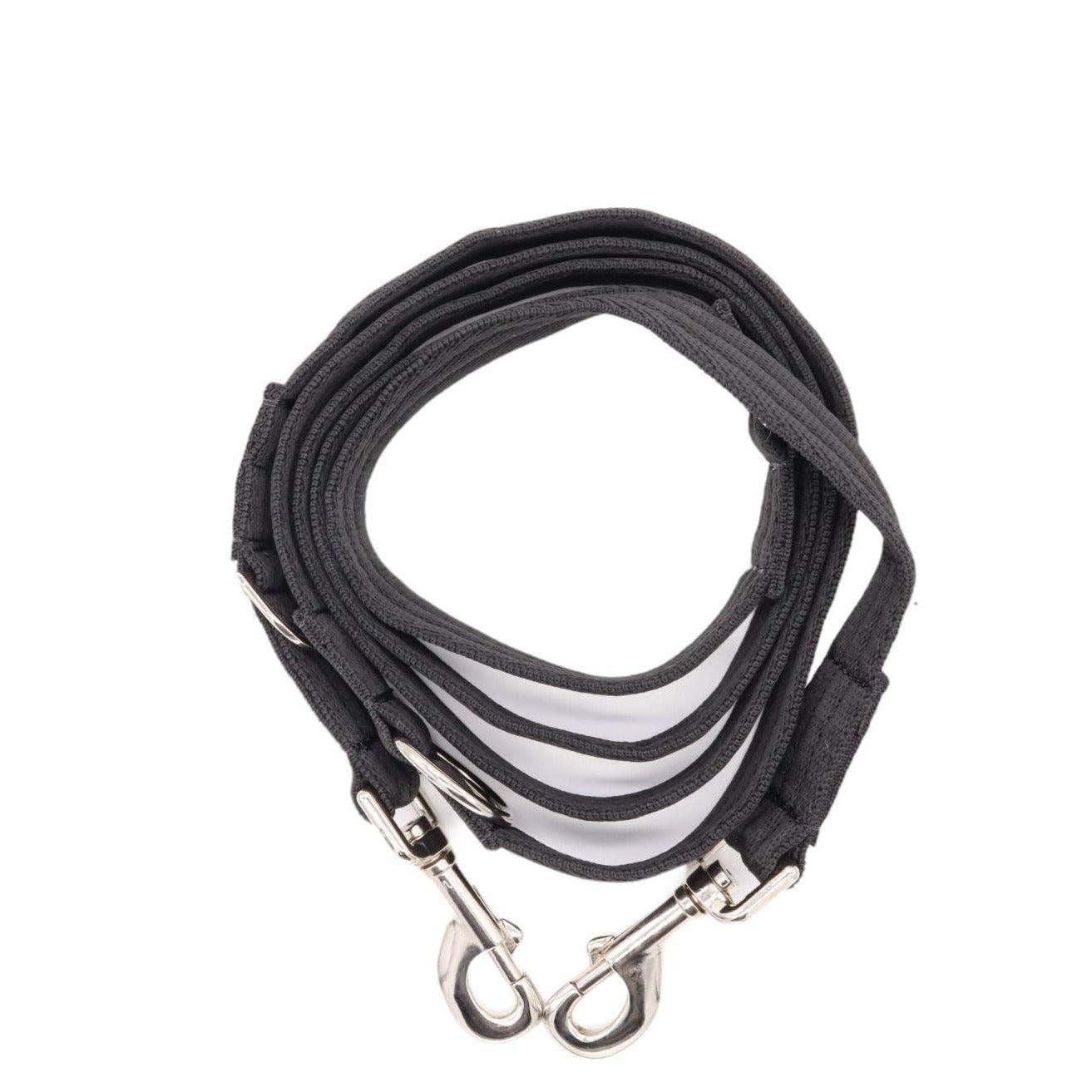 A multi-purpose training lead/ police lead with three rings for different lengths of the lead in black.