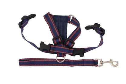 A small navy car safety harness. Adjustable with a handle lead attachment.